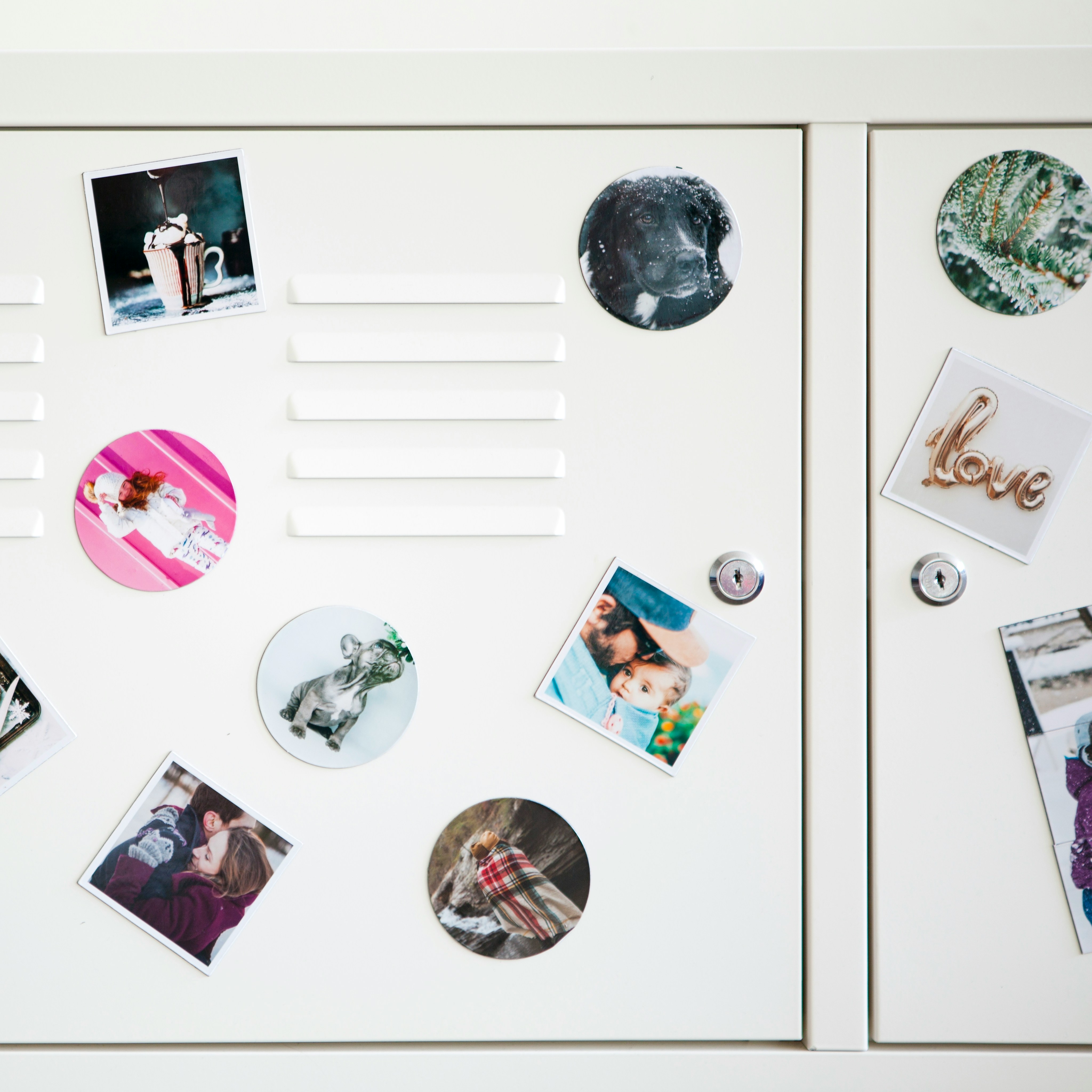 a white refrigerator with magnets and pictures on it